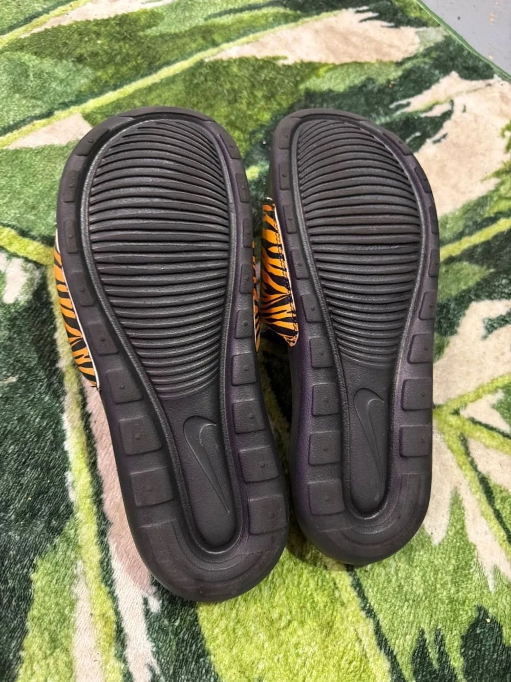 Nike Women's Black Slides with Orange Tiger-Print Strap